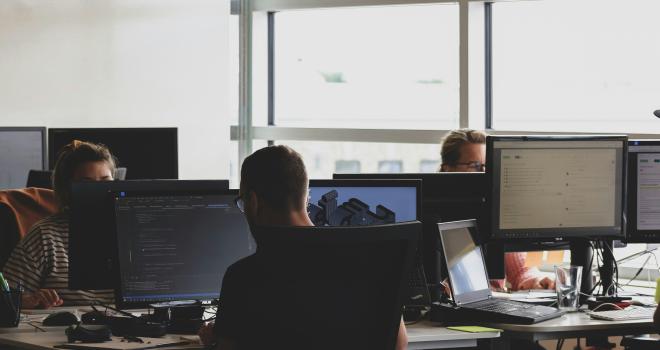 people sitting in a computer lab